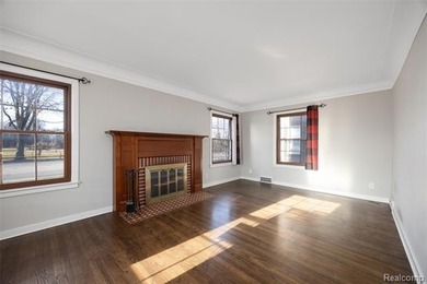 Welcome Home ! This brick bungalow offers an oversized primary on Lochmoor Club in Michigan - for sale on GolfHomes.com, golf home, golf lot