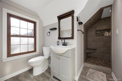 Welcome Home ! This brick bungalow offers an oversized primary on Lochmoor Club in Michigan - for sale on GolfHomes.com, golf home, golf lot