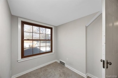 Welcome Home ! This brick bungalow offers an oversized primary on Lochmoor Club in Michigan - for sale on GolfHomes.com, golf home, golf lot