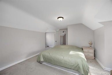 Welcome Home ! This brick bungalow offers an oversized primary on Lochmoor Club in Michigan - for sale on GolfHomes.com, golf home, golf lot