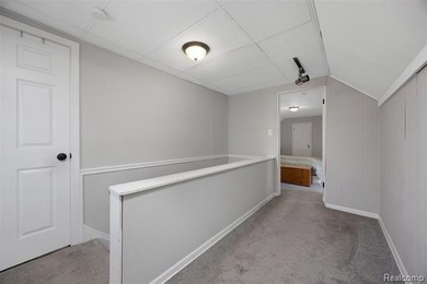 Welcome Home ! This brick bungalow offers an oversized primary on Lochmoor Club in Michigan - for sale on GolfHomes.com, golf home, golf lot