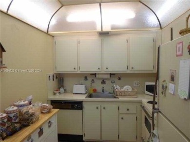 Beautiful 2-Bedroom, 1.5-Bath Condo with Waterfront and Golf on Flamingo Lakes Country Club in Florida - for sale on GolfHomes.com, golf home, golf lot