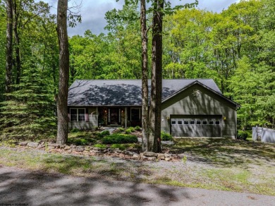 Welcome to Whispering Woods, a stunning ranch-style home nestled on Alpine Lake Resort in West Virginia - for sale on GolfHomes.com, golf home, golf lot