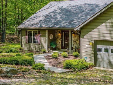 Welcome to Whispering Woods, a stunning ranch-style home nestled on Alpine Lake Resort in West Virginia - for sale on GolfHomes.com, golf home, golf lot