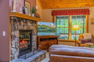 Welcome to Whispering Woods, a stunning ranch-style home nestled on Alpine Lake Resort in West Virginia - for sale on GolfHomes.com, golf home, golf lot