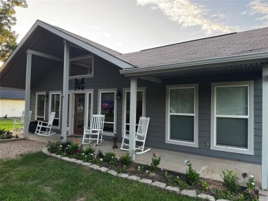 You'll find a wonderful escape from city life in this perfectly on Holly Lake Ranch Golf Club in Texas - for sale on GolfHomes.com, golf home, golf lot