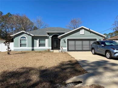Welcome to this beautifully crafted 2023 SeaGate Homes residence on The Grand Club Cypress Course in Florida - for sale on GolfHomes.com, golf home, golf lot