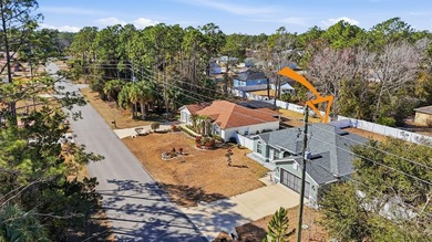 Welcome to this beautifully crafted 2023 SeaGate Homes residence on The Grand Club Cypress Course in Florida - for sale on GolfHomes.com, golf home, golf lot