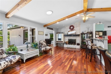 Incredible waterfront home located within the gated community of on Carolina Trace Country Club in North Carolina - for sale on GolfHomes.com, golf home, golf lot