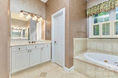 Enjoy beautiful water views of Lake Norman from this charming on Mallard Head Country Club in North Carolina - for sale on GolfHomes.com, golf home, golf lot
