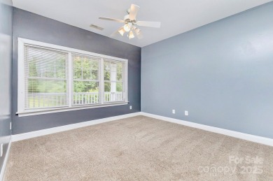 Enjoy beautiful water views of Lake Norman from this charming on Mallard Head Country Club in North Carolina - for sale on GolfHomes.com, golf home, golf lot