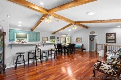 Incredible waterfront home located within the gated community of on Carolina Trace Country Club in North Carolina - for sale on GolfHomes.com, golf home, golf lot