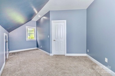 Enjoy beautiful water views of Lake Norman from this charming on Mallard Head Country Club in North Carolina - for sale on GolfHomes.com, golf home, golf lot