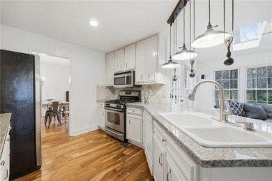 Welcome to 618 Wedgewood Drive, a refined golf-course residence on Canongate At Eagle Watch Golf Club in Georgia - for sale on GolfHomes.com, golf home, golf lot