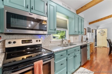 Incredible waterfront home located within the gated community of on Carolina Trace Country Club in North Carolina - for sale on GolfHomes.com, golf home, golf lot