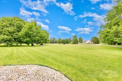 Enjoy beautiful water views of Lake Norman from this charming on Mallard Head Country Club in North Carolina - for sale on GolfHomes.com, golf home, golf lot