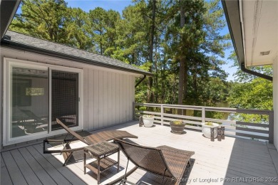 Incredible waterfront home located within the gated community of on Carolina Trace Country Club in North Carolina - for sale on GolfHomes.com, golf home, golf lot