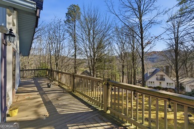 Welcome to this charming mountain chalet, ideally located in the on Sky Valley Resort and Country Club in Georgia - for sale on GolfHomes.com, golf home, golf lot