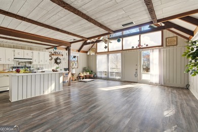 Welcome to this charming mountain chalet, ideally located in the on Sky Valley Resort and Country Club in Georgia - for sale on GolfHomes.com, golf home, golf lot