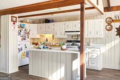 Welcome to this charming mountain chalet, ideally located in the on Sky Valley Resort and Country Club in Georgia - for sale on GolfHomes.com, golf home, golf lot