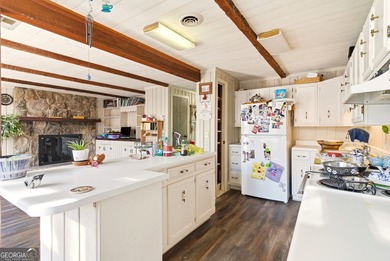 Welcome to this charming mountain chalet, ideally located in the on Sky Valley Resort and Country Club in Georgia - for sale on GolfHomes.com, golf home, golf lot