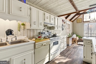 Welcome to this charming mountain chalet, ideally located in the on Sky Valley Resort and Country Club in Georgia - for sale on GolfHomes.com, golf home, golf lot