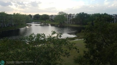 Must see rarely available Top floor 2/2 end unit on the golf on Pine Island Ridge Country Club in Florida - for sale on GolfHomes.com, golf home, golf lot