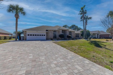 Situated on Hole 16 of Tiger Point Golf Course, this 4 bedroom on Tiger Point Golf and Country Club in Florida - for sale on GolfHomes.com, golf home, golf lot