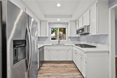 26848 Oak Branch Cir | Newhall, CA 91321
Light-Filled End Unit on Friendly Valley Golf Course in California - for sale on GolfHomes.com, golf home, golf lot