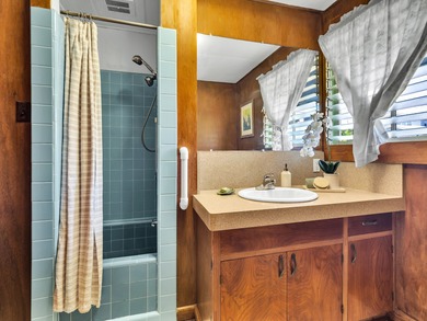 This spacious, classic midcentury Hilo home has been in the same on Hilo Municipal Golf Course in Hawaii - for sale on GolfHomes.com, golf home, golf lot