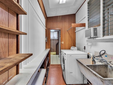 This spacious, classic midcentury Hilo home has been in the same on Hilo Municipal Golf Course in Hawaii - for sale on GolfHomes.com, golf home, golf lot