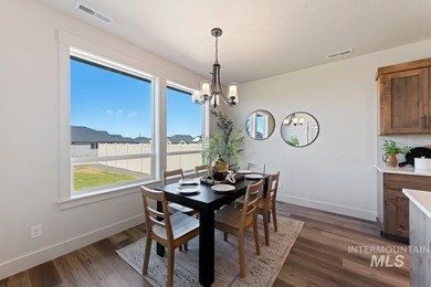 Thoughtfully designed single-level floor plan offers 3 bedrooms on Hunters Point Golf Club in Idaho - for sale on GolfHomes.com, golf home, golf lot