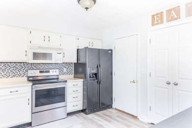 Beautifully updated townhome offers three finished levels with on Boone Links Golf Course in Kentucky - for sale on GolfHomes.com, golf home, golf lot