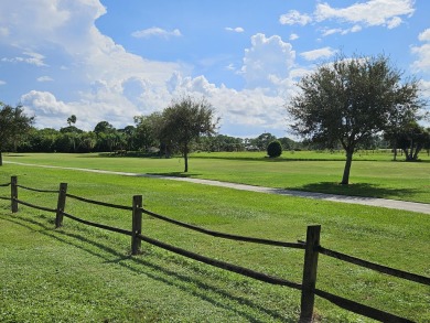 OPEN GOLF COURSE VIEW of the pond, and you own the land. This 1 on Heritage Ridge Golf Club in Florida - for sale on GolfHomes.com, golf home, golf lot