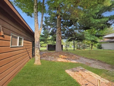 This charming Northwoods-style 1 bed, 1 bath cabin is just on Northern Bay Golf Resort and Marina in Wisconsin - for sale on GolfHomes.com, golf home, golf lot