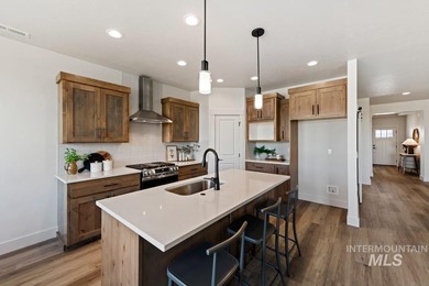 Thoughtfully designed single-level floor plan offers 3 bedrooms on Hunters Point Golf Club in Idaho - for sale on GolfHomes.com, golf home, golf lot