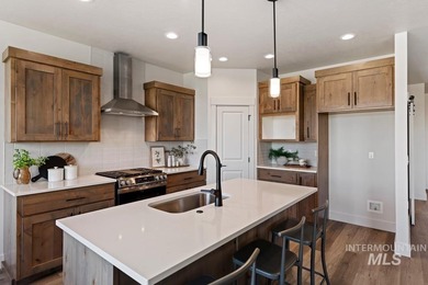 Thoughtfully designed single-level floor plan offers 3 bedrooms on Hunters Point Golf Club in Idaho - for sale on GolfHomes.com, golf home, golf lot