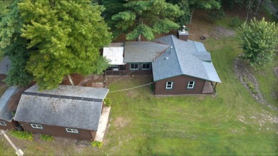 This charming Northwoods-style 1 bed, 1 bath cabin is just on Northern Bay Golf Resort and Marina in Wisconsin - for sale on GolfHomes.com, golf home, golf lot