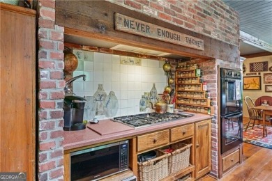 Stunning 3 bedroom, 3.5 bath ranch over basement with exquisite on Atlanta Athletic Club in Georgia - for sale on GolfHomes.com, golf home, golf lot
