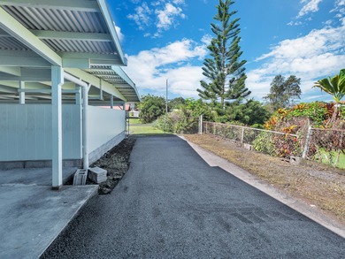 This spacious, classic midcentury Hilo home has been in the same on Hilo Municipal Golf Course in Hawaii - for sale on GolfHomes.com, golf home, golf lot