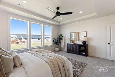 Thoughtfully designed single-level floor plan offers 3 bedrooms on Hunters Point Golf Club in Idaho - for sale on GolfHomes.com, golf home, golf lot
