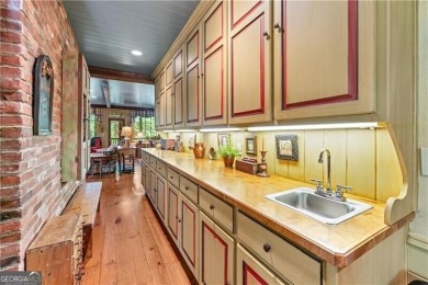 Stunning 3 bedroom, 3.5 bath ranch over basement with exquisite on Atlanta Athletic Club in Georgia - for sale on GolfHomes.com, golf home, golf lot