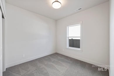 Thoughtfully designed single-level floor plan offers 3 bedrooms on Hunters Point Golf Club in Idaho - for sale on GolfHomes.com, golf home, golf lot