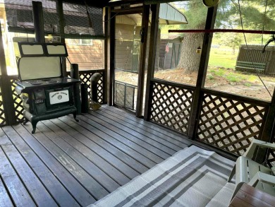 This charming Northwoods-style 1 bed, 1 bath cabin is just on Northern Bay Golf Resort and Marina in Wisconsin - for sale on GolfHomes.com, golf home, golf lot