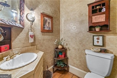 Stunning 3 bedroom, 3.5 bath ranch over basement with exquisite on Atlanta Athletic Club in Georgia - for sale on GolfHomes.com, golf home, golf lot