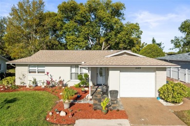 Updated Price, Same Charm! This home welcomes you to the life on Highland Lakes Executive Golf Course in Florida - for sale on GolfHomes.com, golf home, golf lot