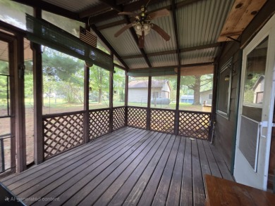 This charming Northwoods-style 1 bed, 1 bath cabin is just on Northern Bay Golf Resort and Marina in Wisconsin - for sale on GolfHomes.com, golf home, golf lot