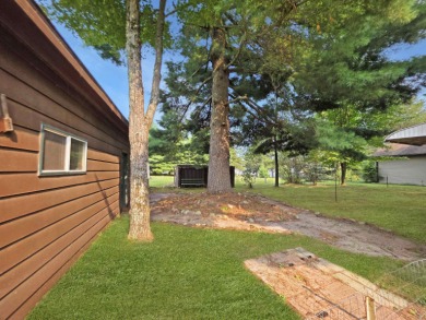 This charming Northwoods-style 1 bed, 1 bath cabin is just on Northern Bay Golf Resort and Marina in Wisconsin - for sale on GolfHomes.com, golf home, golf lot