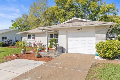 Updated Price, Same Charm! This home welcomes you to the life on Highland Lakes Executive Golf Course in Florida - for sale on GolfHomes.com, golf home, golf lot