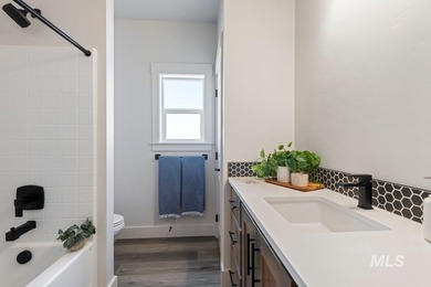 Thoughtfully designed single-level floor plan offers 3 bedrooms on Hunters Point Golf Club in Idaho - for sale on GolfHomes.com, golf home, golf lot